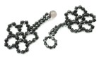 CLASP CONSTRUCTION WITH CRYSTALLS BLACK
