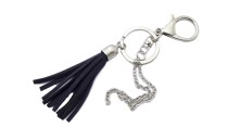 CONSTRUCTION WITH TASSEL CHAIN AND RING
