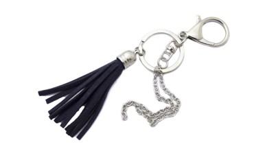 CONSTRUCTION WITH TASSEL CHAIN AND RING